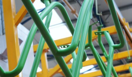 Powder coated bent fabricated tube