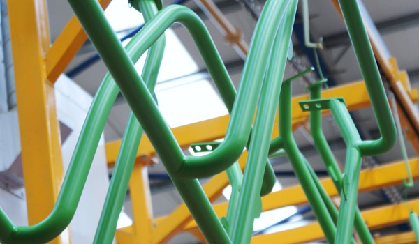 Powder coated bent fabricated tube